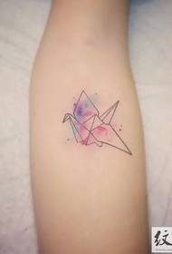 Fresh and simple paper crane tattoo
