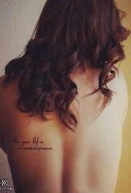Female back small fresh letter tattoo pattern