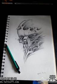 Umbhalo wesandla we-Horror thriller head tattoo