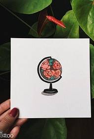 Manuscript painted globe tattoo pattern