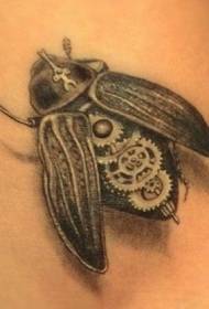 Pola tattoo kumbang mékanis biomekanik
