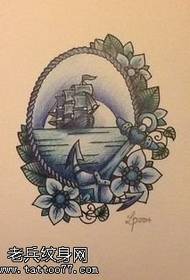 Motif de tatouage de beau voilier dans un miroir manuscrit
