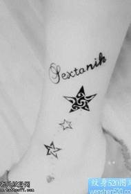 Good looking five-pointed star tattoo on the legs