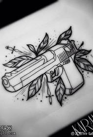 Delikata malgranda pistola manuskripta tatuaje ŝablono