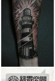 Braccio popolare cool un modello di tatuaggio faro