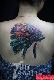 Prachtich tribal feather headdress tattoo patroan