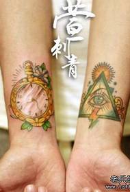 Rellotge de butxaca amb braç infantil amb patró de tatuatge als ulls
