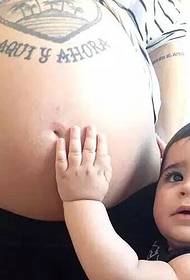 very personal tattoo of a loving young parent