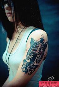 Girl arm is very popular skeleton tattoo pattern