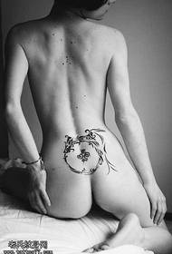 totem tatuaggio fenice nero