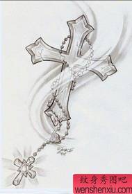 ένα κομψά όμορφο μοτίβο σταυρών τατουάζ