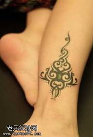 good totem tattoo pattern on the leg