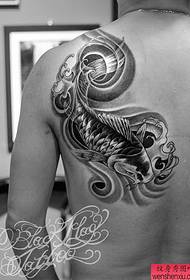 a back squid tattoo pattern shared by the tattoo show map