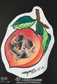 Ang sumbanan nga hinimo sa kamot nga peach skull sa tattoo