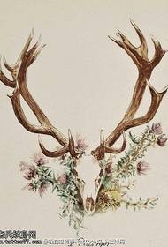 Rukopis uzorak cvijeta tetovaže s uglovima u obliku gazele