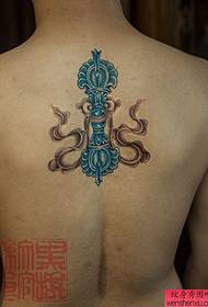 L'immagine dello spettacolo di tatuaggi ha raccomandato un modello di tatuaggio vagina con diamante sul retro
