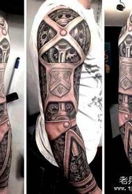 La barra dello spettacolo del tatuaggio ha raccomandato un modello di tatuaggio meccanico a braccio di fiori