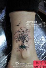 girl's legs are beautifully popular with small tree tattoos