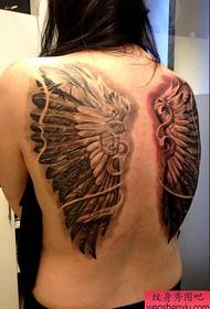 rekommenderar en vacker helback Wing tatuering fungerar
