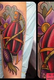 a European-style style grenade tattoo
