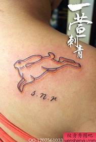 girls shoulders a phantom bunny tattoo pattern