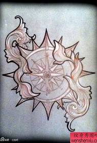 популярний рукопис татуювання компаса