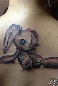 Patrón de tatuaje de conejito de muñeca de dibujos animados de belleza