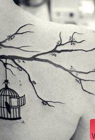 女孩肩膀鳥鳥籠與樹枝紋身圖案