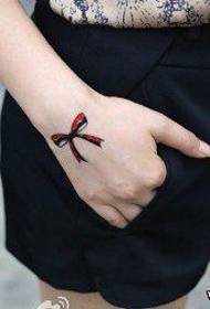 lány kézzel néz ki íj tetoválás minta