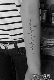 a stylish arm ECG tattoo pattern