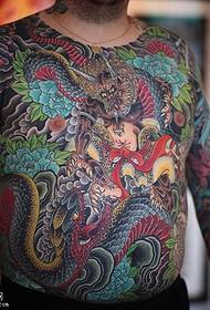 pola tatu perang naga sing dicet naga