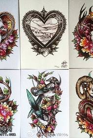 Modello classico del tatuaggio del manoscritto del fiore dell'antilope