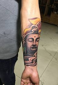 braccio buddha tatuaggio immagine prepotente