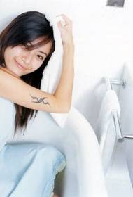 Xu Huaiqi brako totem moda tatuaje