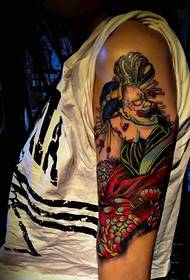 foto tatuaggio braccio grande colore fiore Abbastanza accattivante