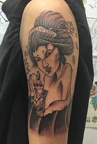 foto tatoo flè ak mask prajna a