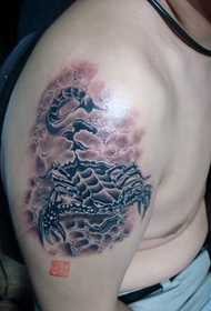 domineering tweezers tattoo on the big arm