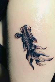 female arm black gray small goldfish tattoo