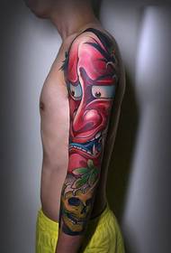 Modello classico di tatuaggio rosso accattivante con braccio floreale accattivante