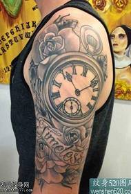 I-Arm Flower Clock Tattoo iphethini