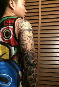 handsome black gray arm tattoo