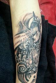 arm dominante Erlang God totem tattoo