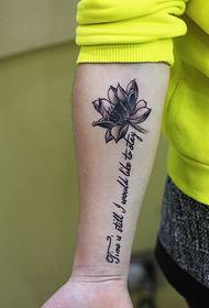 Pictiúr tatú tattoo comhcheangailte Lotus agus Béarla