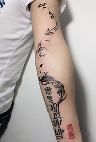 arm personality Sanskrit feather tattoo