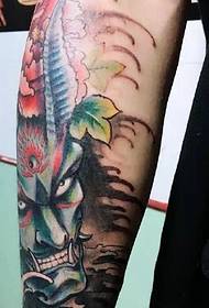 heavy taste arm color evil totem tattoo