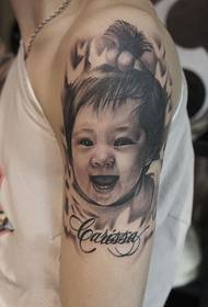 male arm Cute baby portrait tattoo work