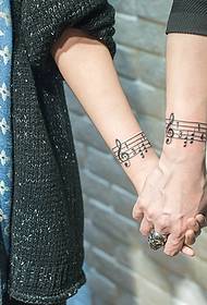 cinta musik pasangan lengan gambar tato musik