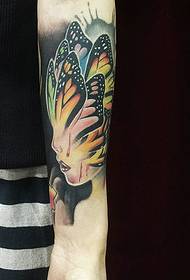 tattoo picture of a mixed butterfly and beauty portrait