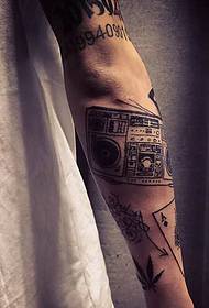 very artistic arm camera tattoo picture