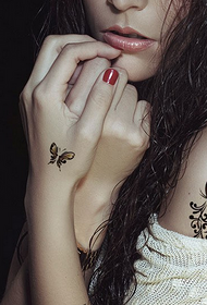 pretty butterfly girl shoulder tattoo